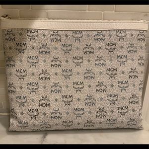 MCM zip top clutch